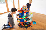 Hot Wheels - City Robo-T-Rex, MEGA city Parkgarage mit T-Rex Angriff, mehrstöckig, Mehrspieler-Modus, Platz für +100 Fahrzeuge im Maßstab 1:64, Spielzeug Geschenkidee für Kinder ab 3 Jahren