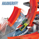 Hot Wheels - City Ultimate Parkgarage und Parkhaus für Kinder, Garage mit Hai für +90 Autos, mit Looping Tracks inkl. 2 Spielzeugautos, ca. 63 cm hoch, ab 5 Jahren, Mehrfarbig