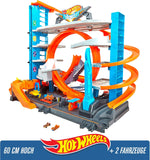 Hot Wheels - City Ultimate Parkgarage und Parkhaus für Kinder, Garage mit Hai für +90 Autos, mit Looping Tracks inkl. 2 Spielzeugautos, ca. 63 cm hoch, ab 5 Jahren, Mehrfarbig