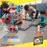 Hot Wheels - City Ultimate Parkgarage und Parkhaus für Kinder, Garage mit Hai für +90 Autos, mit Looping Tracks inkl. 2 Spielzeugautos, ca. 63 cm hoch, ab 5 Jahren, Mehrfarbig